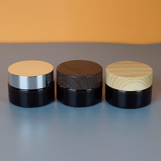 Confezione cosmetica per la cura della pelle sostenibile in bambù da 10 g di crema per il viso, bottiglia in vetro ambrato con coperchio in bambù