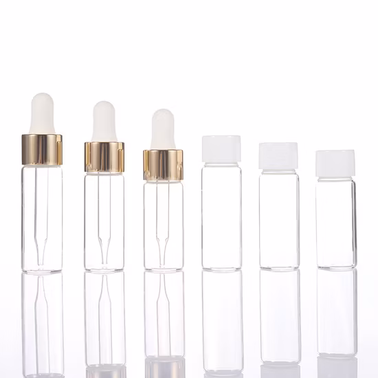 Flacone contagocce in vetro per profumo di olio essenziale ambrato con bambino